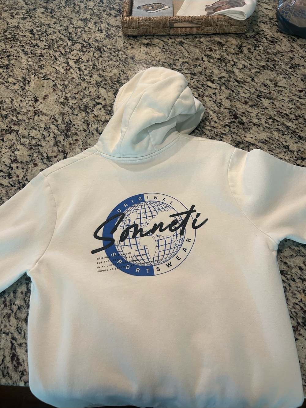 Sonneti cream performance hoodie.